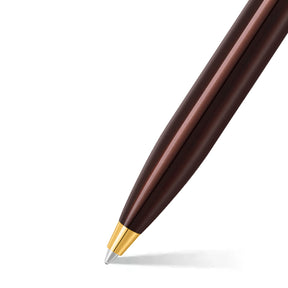 A Sheaffer® 100 9370 Glossy Coffee Brown Ballpoint Pen With PVD Gold-Tone Trim on a white background, offering a luxurious writing experience and makes for an ideal gift.